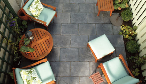 patio with chairs and soft furnishings